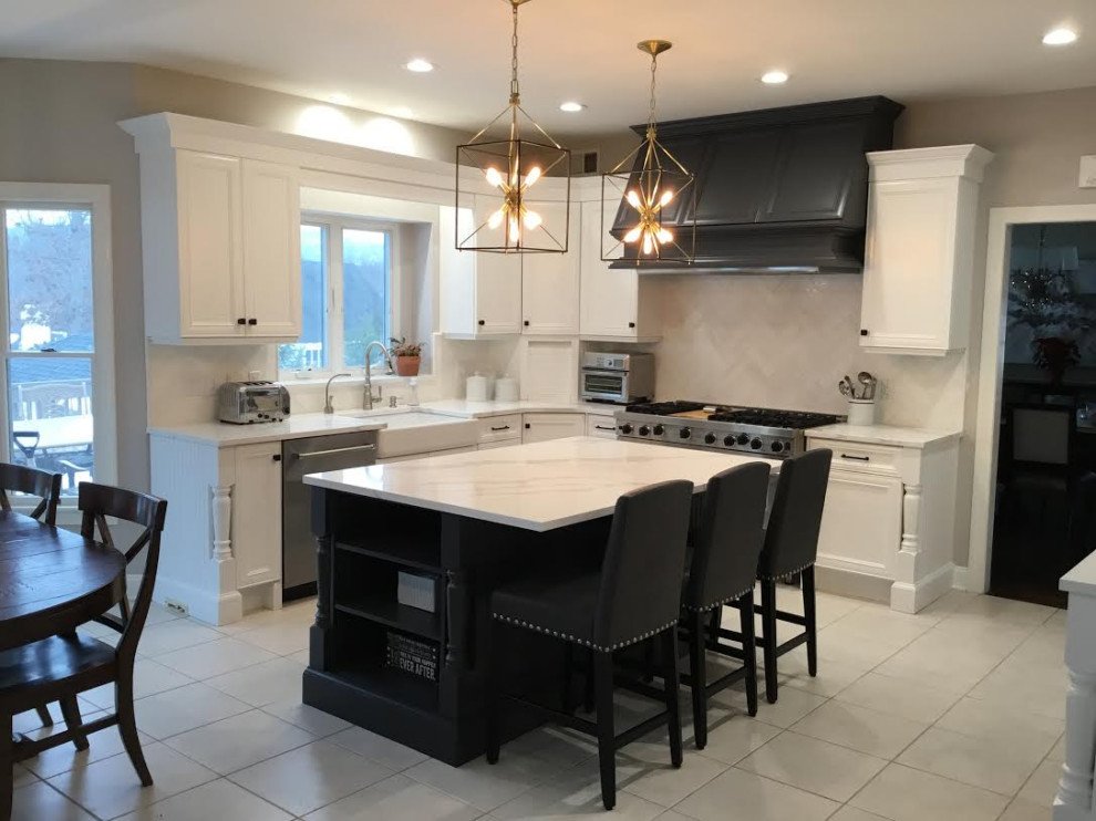 A Transitional Kitchen with a Gorgeous Herringbone Marble Backsplash